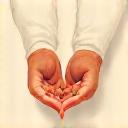 Icon representing authentic connection: two hands gently clasped together in front of a subtly visible globe.
