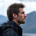 David reflecting by a mountain lake in Patagonia